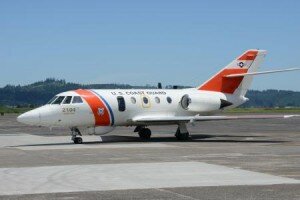 An HU-25 Falcon jet arrives at Coast Guard Sector Columbia River's Air Station Astoria in Warrenton, Ore., moments after landing from its final flight, June 28, 2013. The retired Falcon, the primary fixed-wing aircraft for more than 30 years at Air Station Cape Cod, Mass., will remain at Sector Columbia River and soon go on permanent display. U.S. Coast Guard photo by Petty Officer 3rd Class Nate Littlejohn.