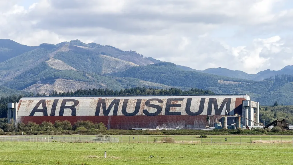 The Tillamook Air Museum hangar with the Coast Range behind it