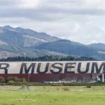 The Tillamook Air Museum hangar with the Coast Range behind it